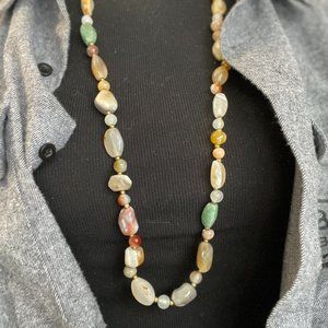 Vintage glass bead necklace in neutral color pallet.